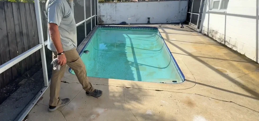 After: releveled pool deck with cracks repaired