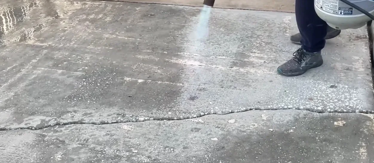 Before: cracked worn concrete patio surface