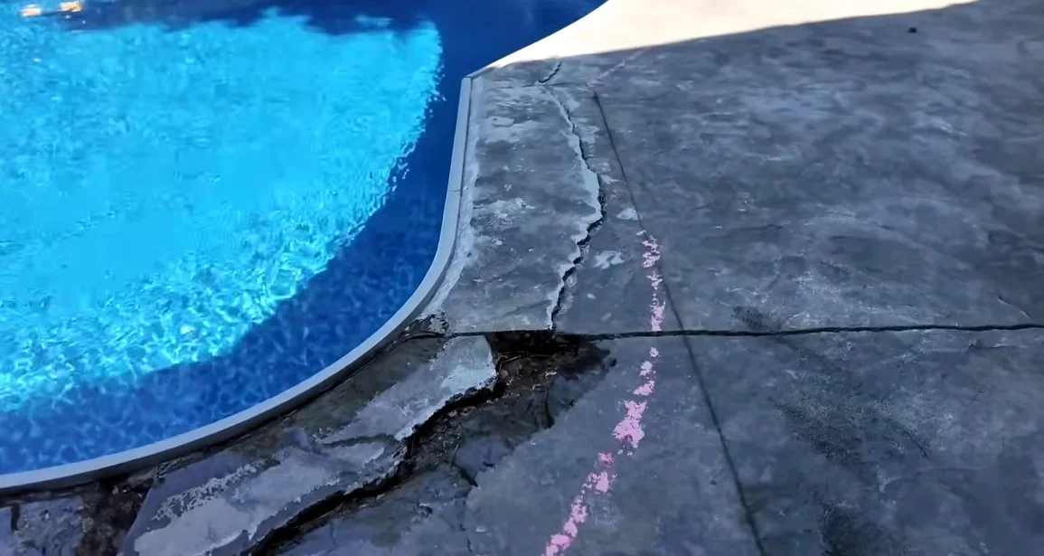 Cracked and damaged pool deck concrete in Phoenix, AZ